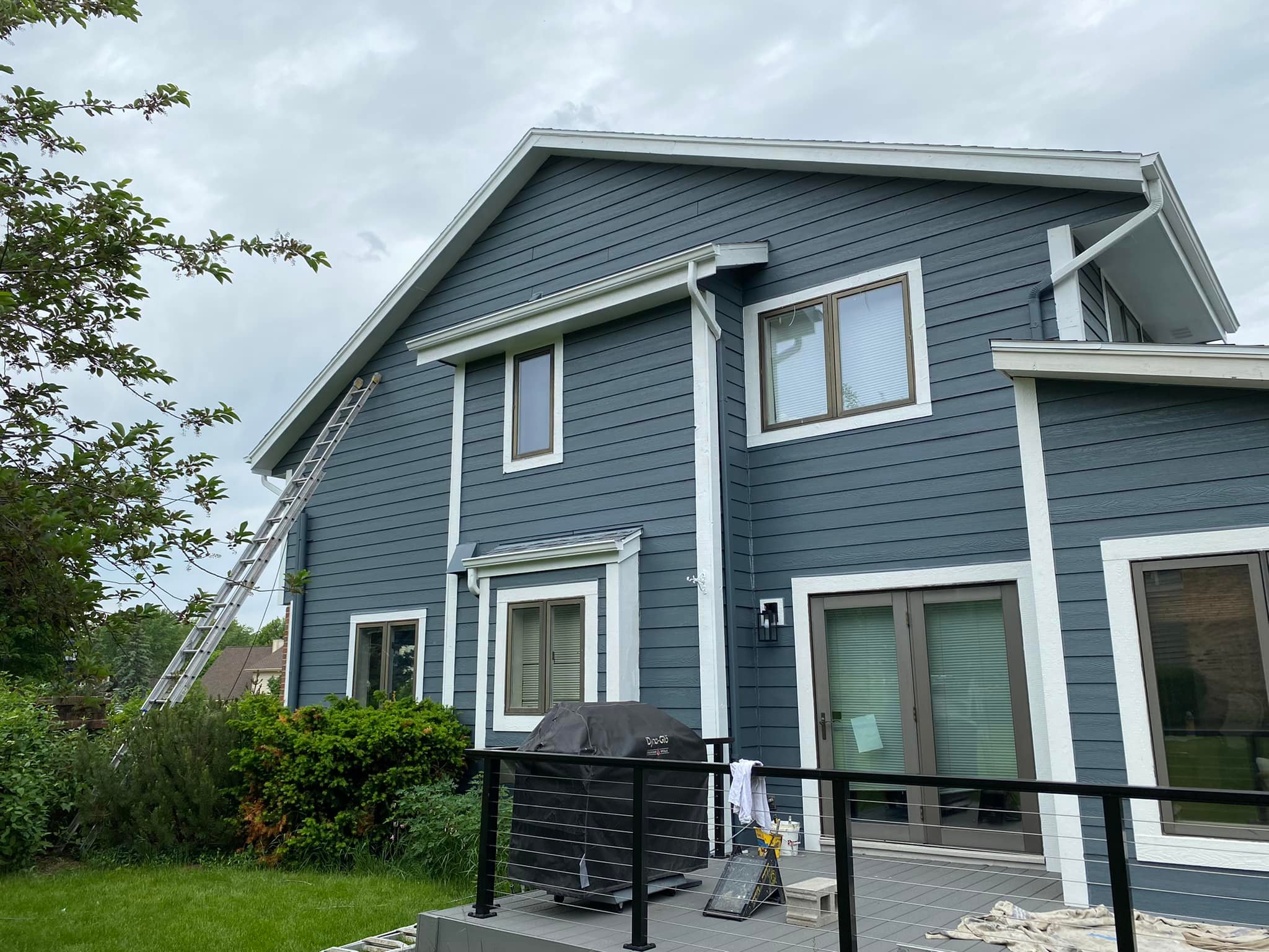 blue exterior painting project